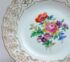Meissen Prunkteller Rosettendurchbruch Blumenmalerei 