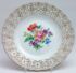 Meissen Prunkteller Rosettendurchbruch Blumenmalerei 